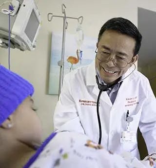 Doctor smiling at patient