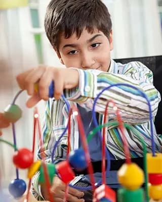 Child plays with toys