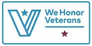 Badge that says, "We Honor Veterans."