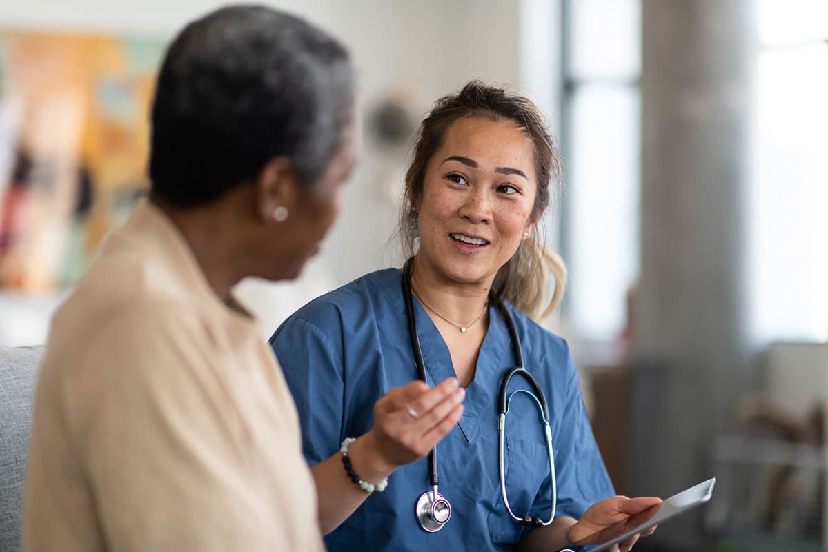 Woman speaking with a doctor